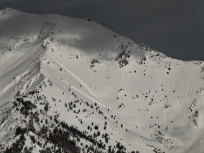 These appear to be two small, skier-triggered wind slab avalanches on Galena Peak. 10,400', S.