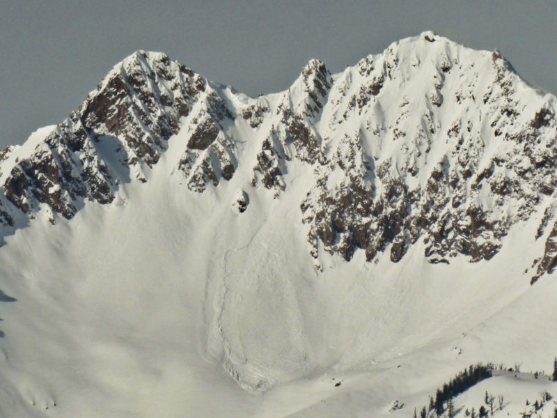 A wet loose avalanche in the central Sawtooths that triggered a small slab avalanche.