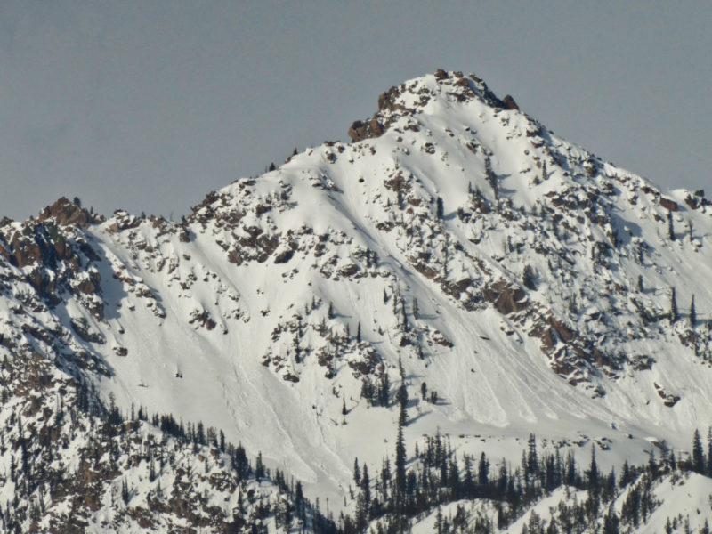 Numerous wet loose avalanches in the central Sawtooths. A few slides on the left side of the photo broke wider into small slab avalanches.